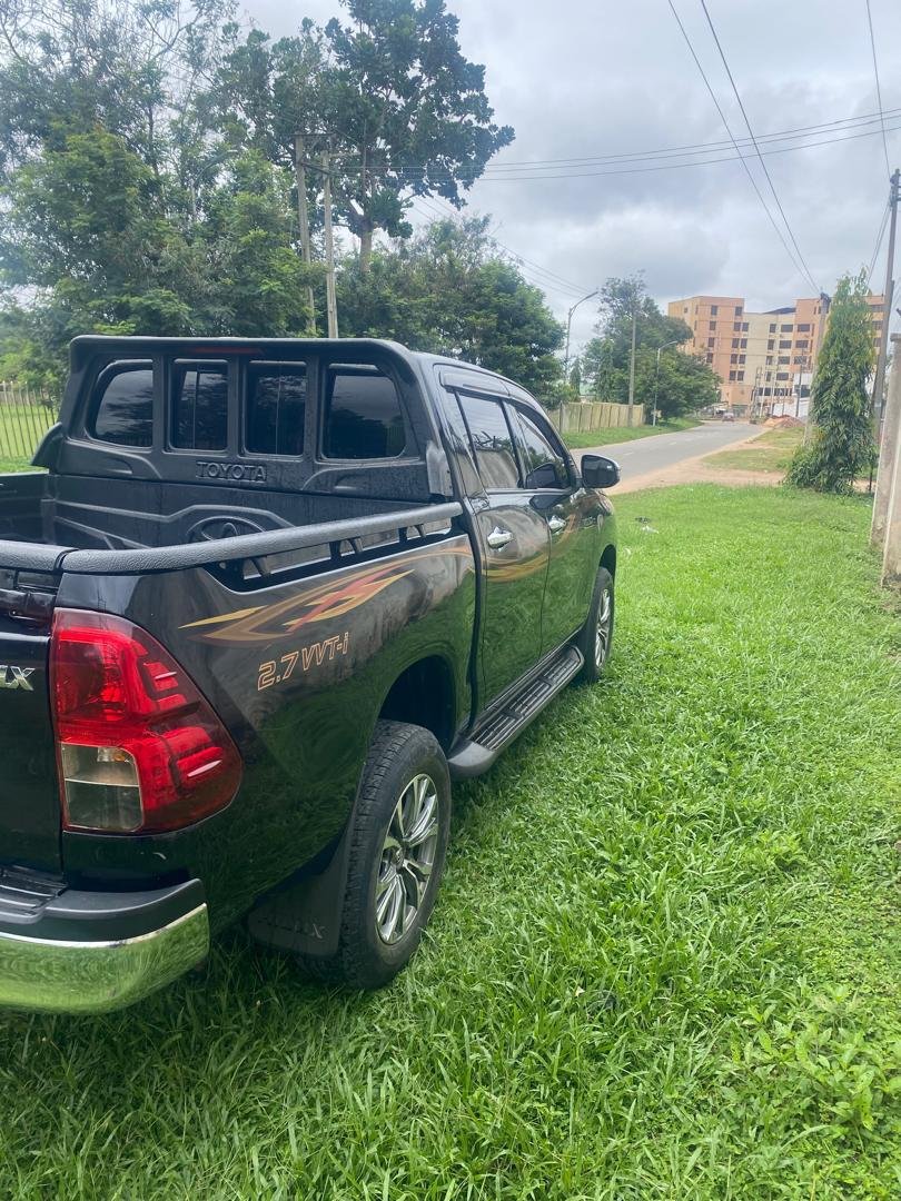 Black Toyota Hilux double cabin pickup for hire in Nigeria